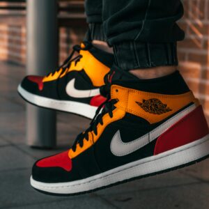Air Jordan sneakers captured in an urban setting, showcasing classic style and vibrant colors.